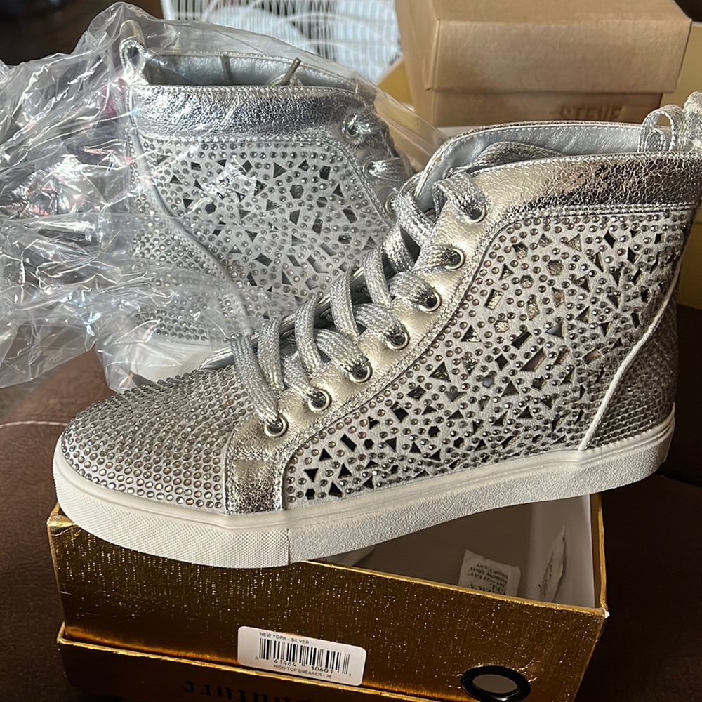 Lady Couture New York silver high top sneakers.
